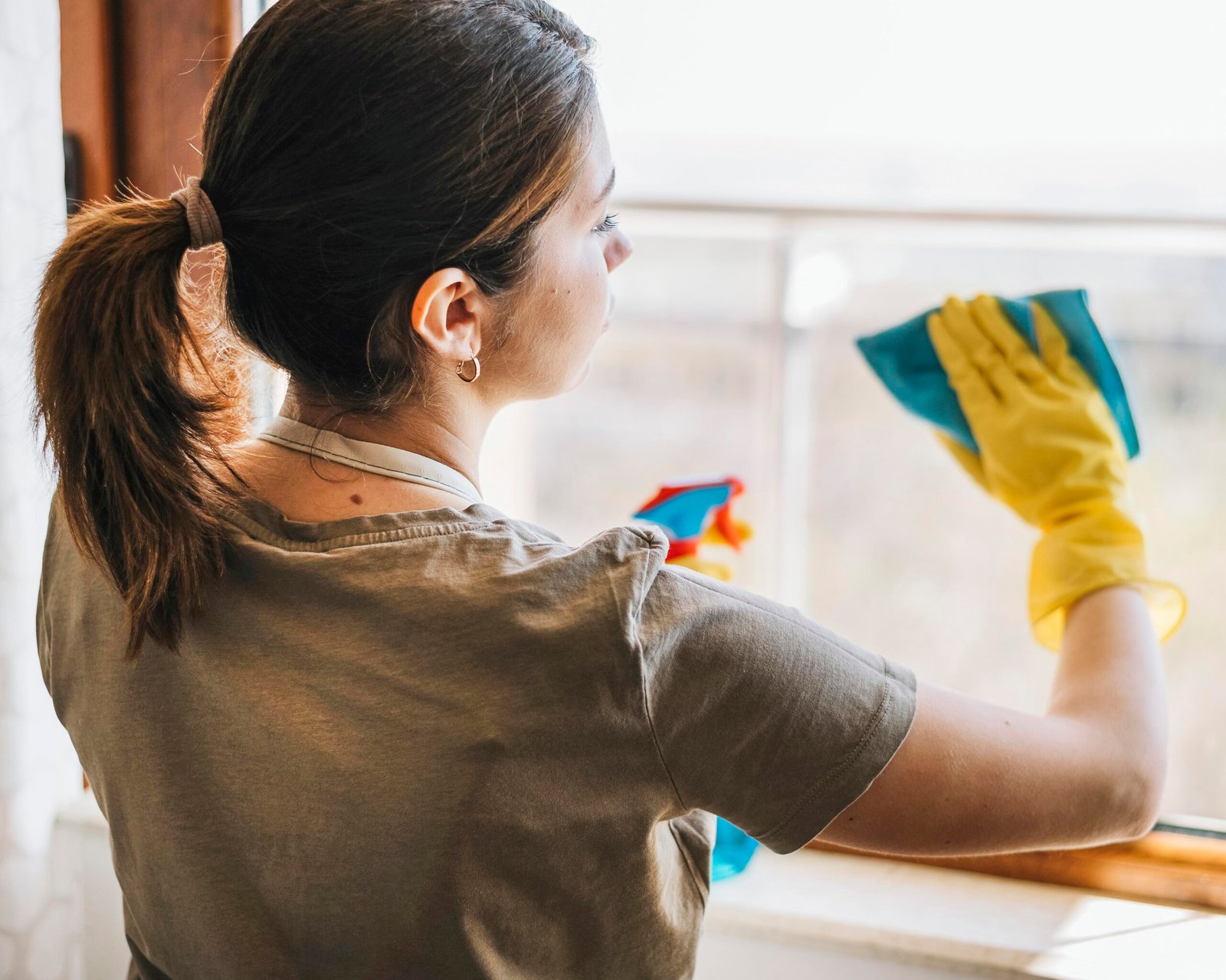 Medium Shot Woman Cleaning Window Scaled
